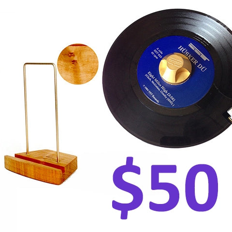 Seven inch record with wood and brass display stand