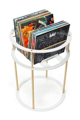 LP-C vinyl record pedestal filled with more than fifty vinyl LPs with two album covers visable 