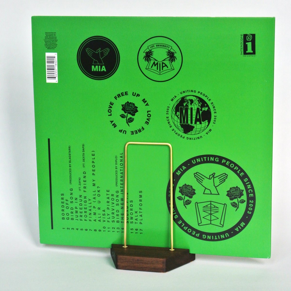 Green cardboard record album cover with black text and graphics