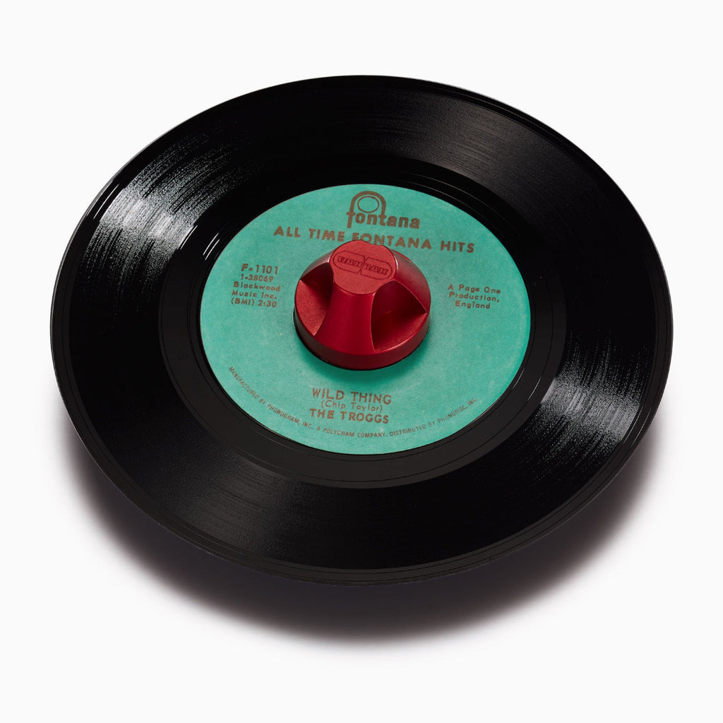 Cherry red aluminum 45 adapter with aqua blue label 45 rpm record
